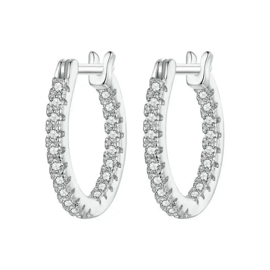 Pair of silver hoop earrings with diamond accents on a white background