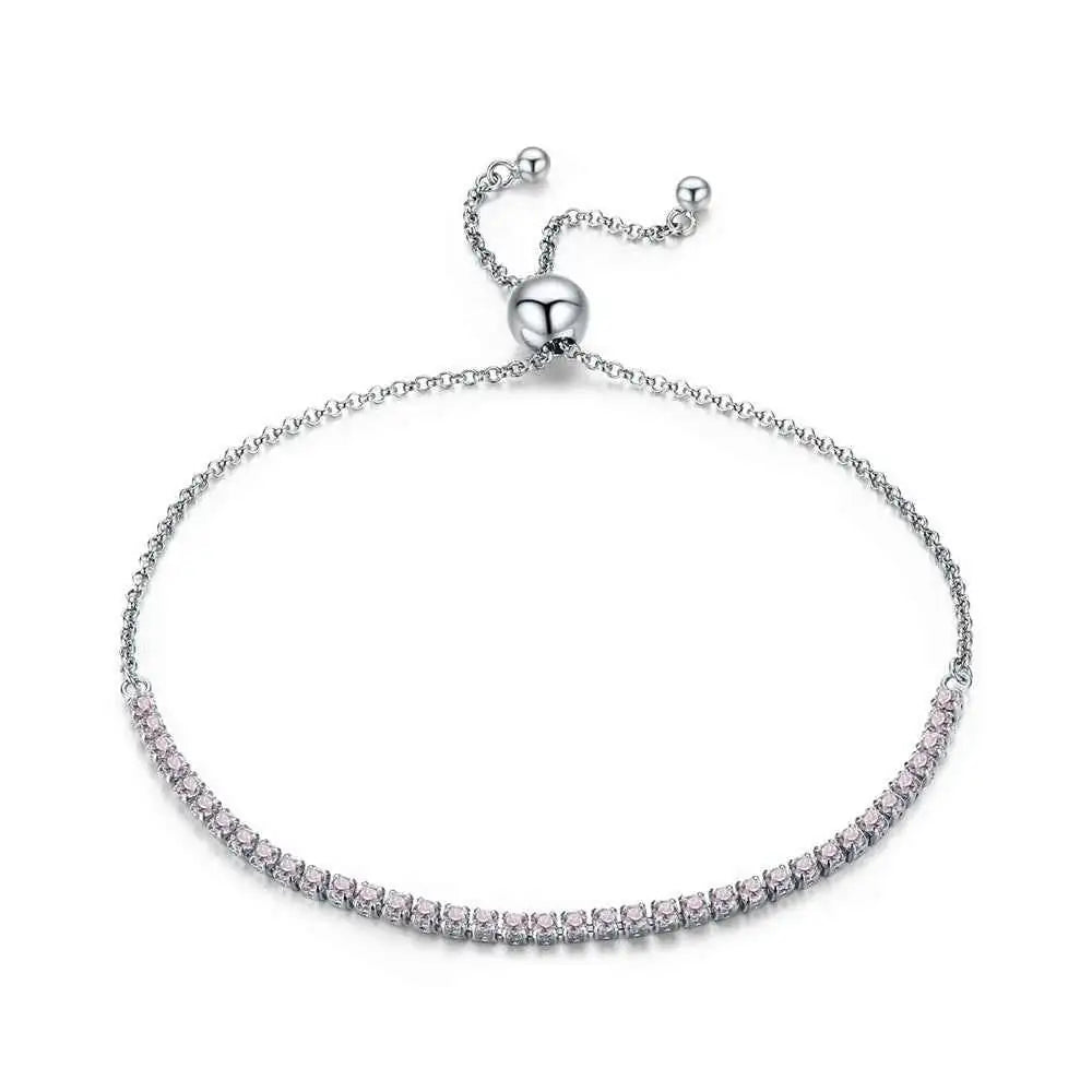 Silver bracelet with small diamonds on a white background