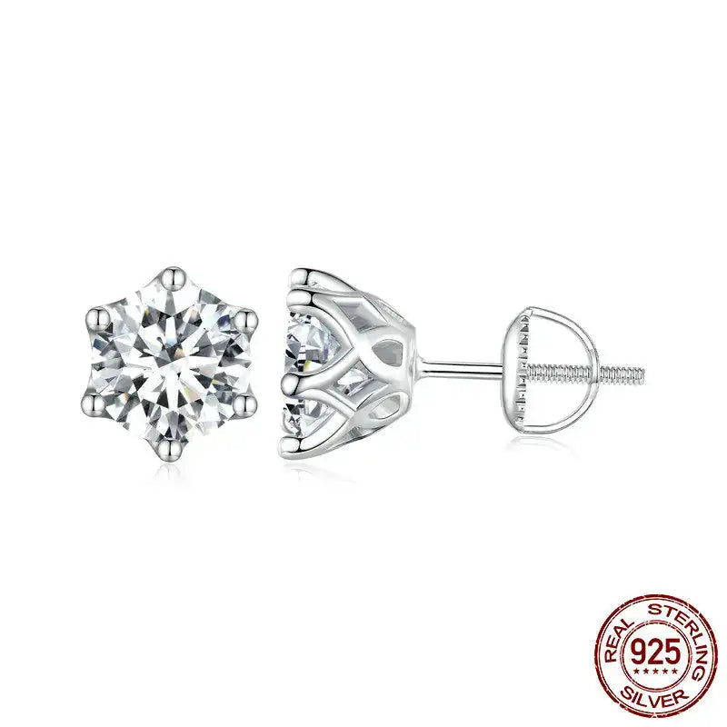 A pair of round cut Moissanite stud earrings set in silver mounting, with a screw back closure.