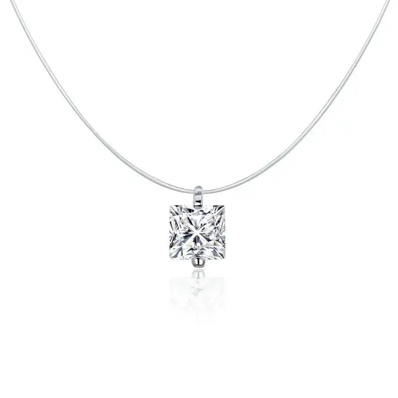 A classic princess-cut diamond solitaire pendant necklace on a delicate silver chain, shown against a clean white background with a soft reflection below.
